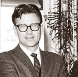 Doug Pfeiffer, A founder of PSIA, poses in a old black and white photo.